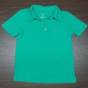 Green dinosaur pocket polo shirt
